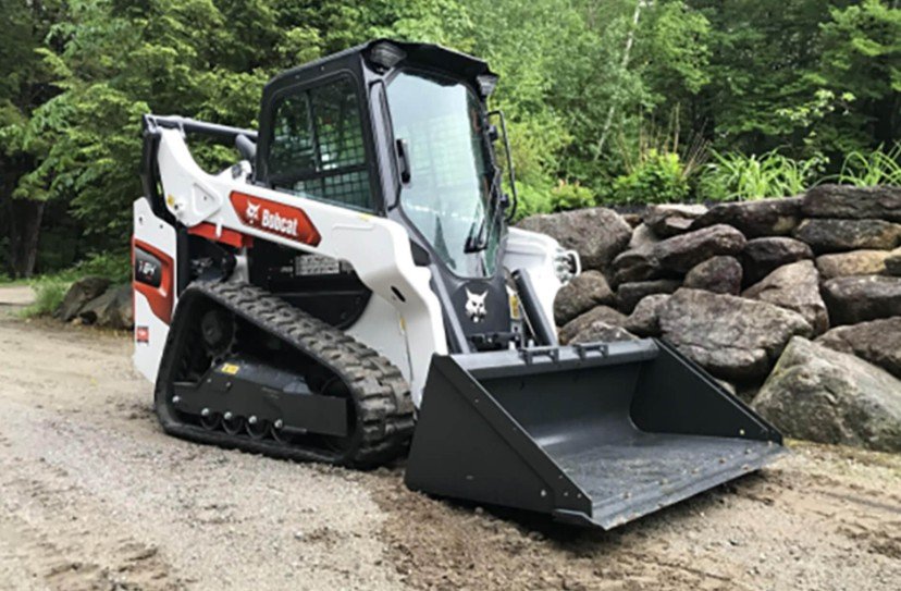 Skid steer machine used for residential land clearing